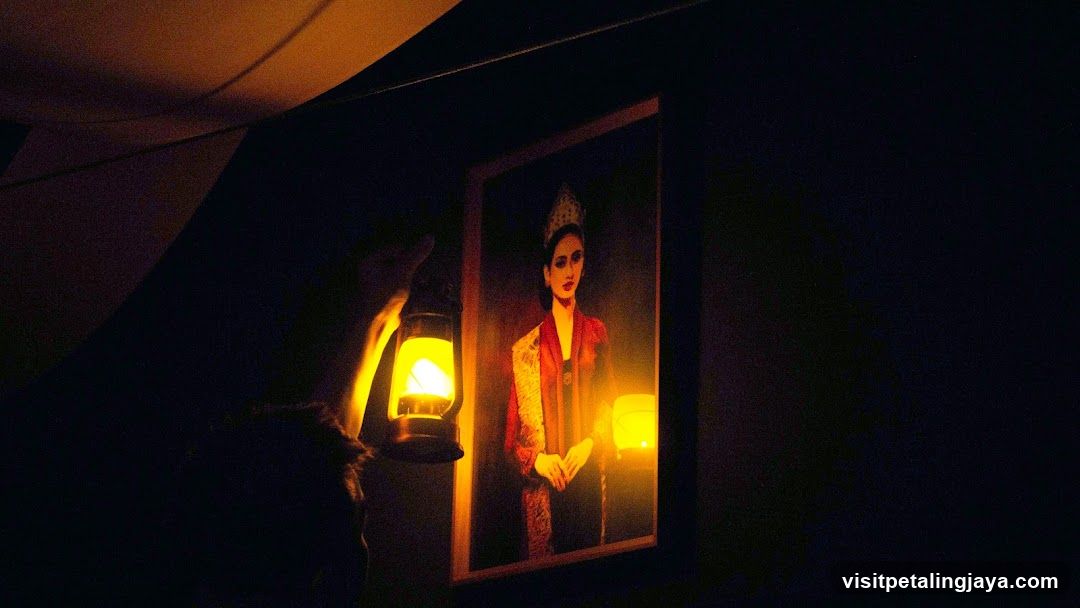Lantern-lit Portrait in Dark Interior