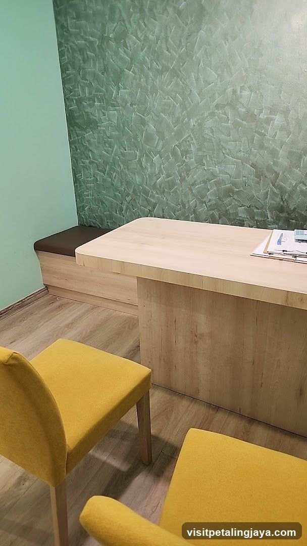 Interior Room with Wooden Desk and Yellow Chairs