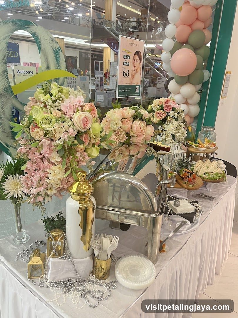 Decorated Buffet Table with Floral Arrangements and Balloons