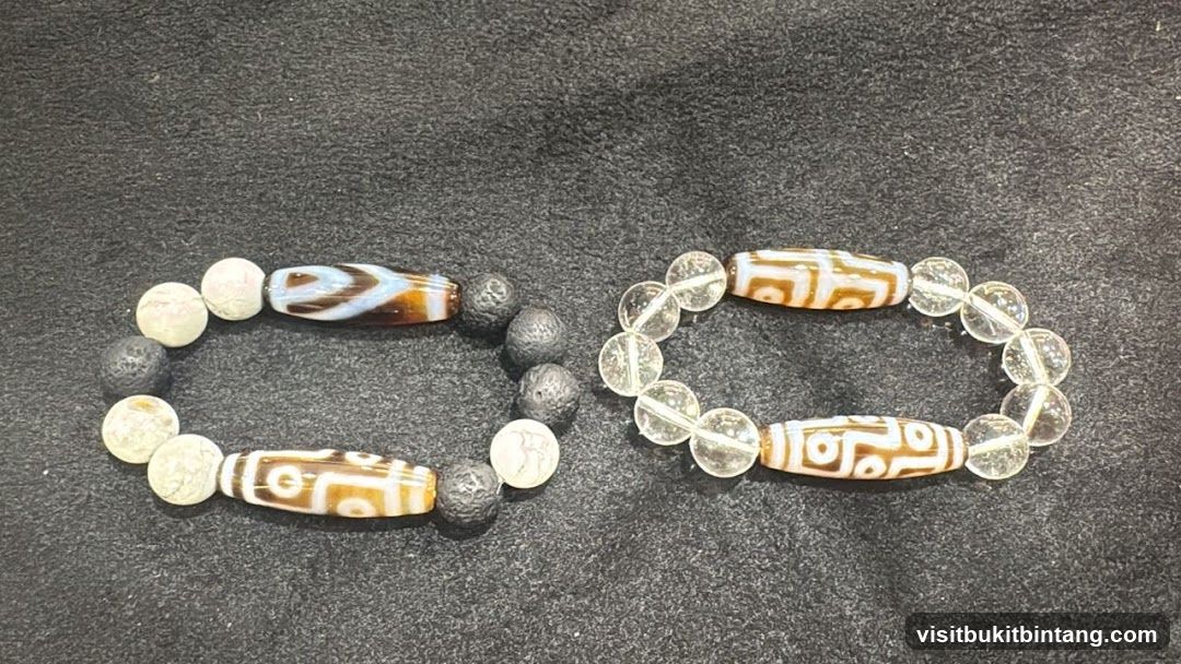 Two bracelets with dzi beads