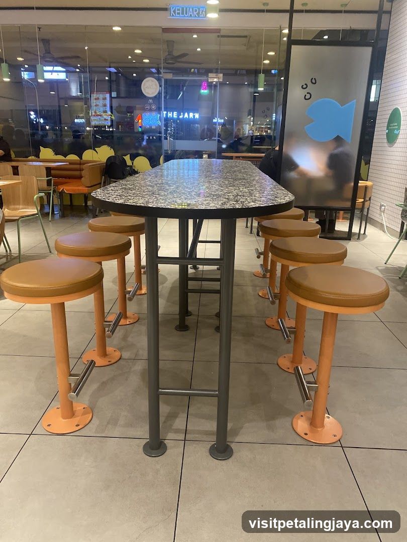 High Table and Stools in a Cafeteria or Food Court