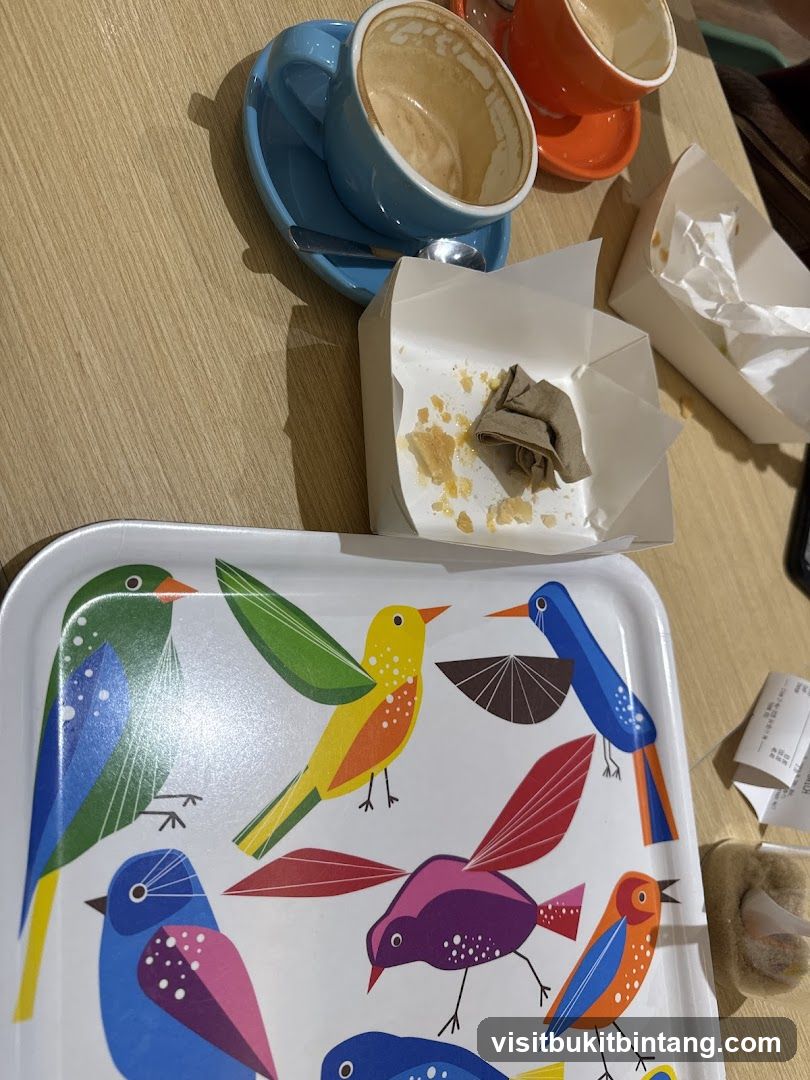 Coffee cups and tray with bird design