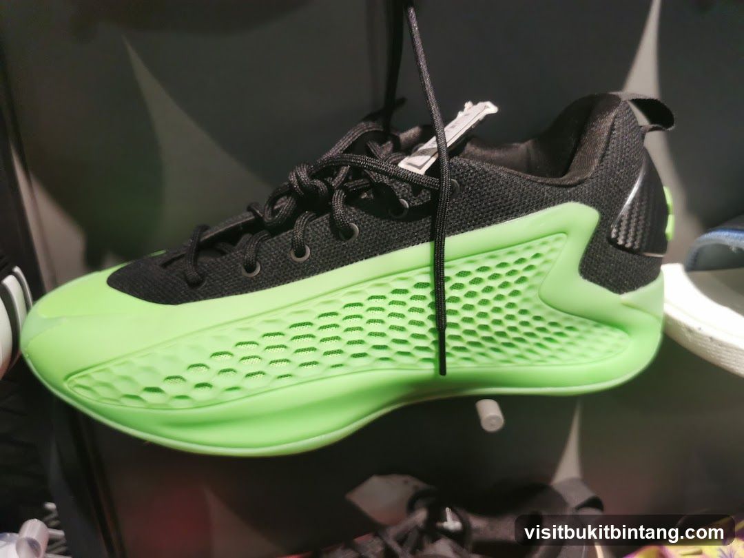 Black and neon green athletic shoe