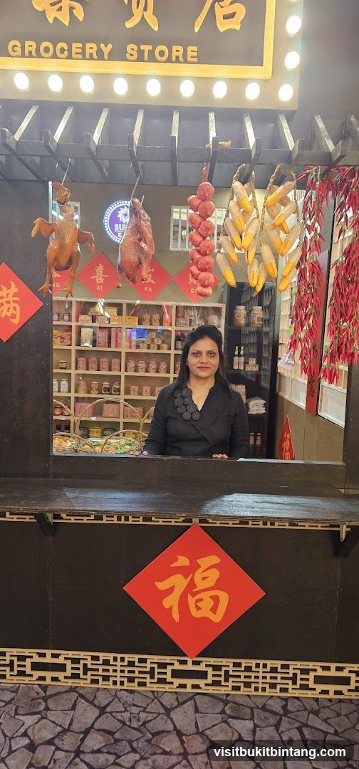 Woman in front of a grocery store