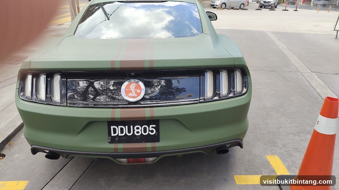 Green Mustang with Cobra Emblem