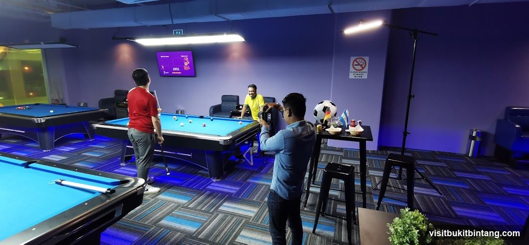 People playing pool
