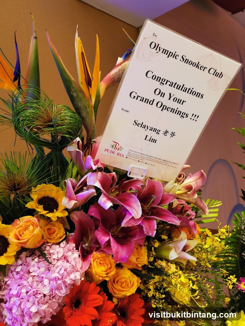 Flower arrangement with congratulatory card