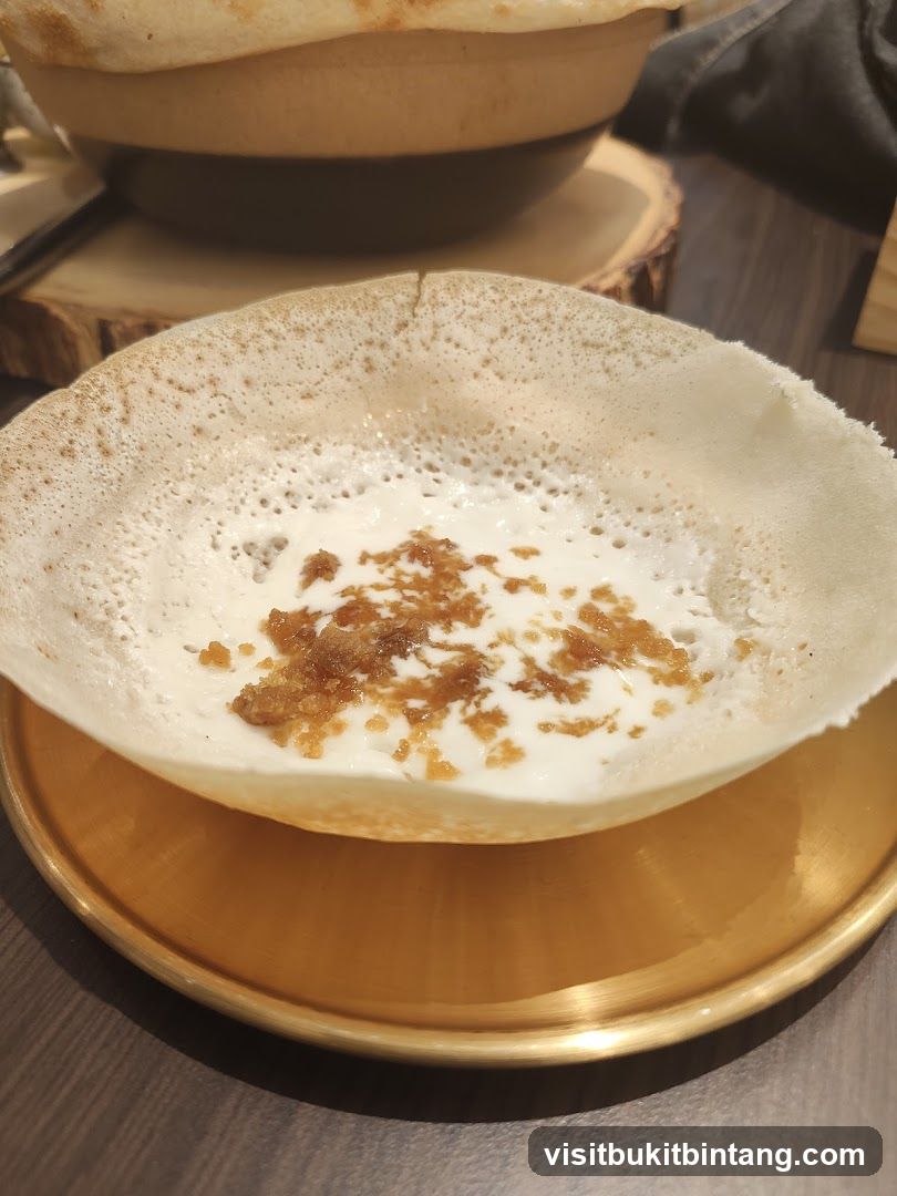 Appam with Coconut Milk and Jaggery