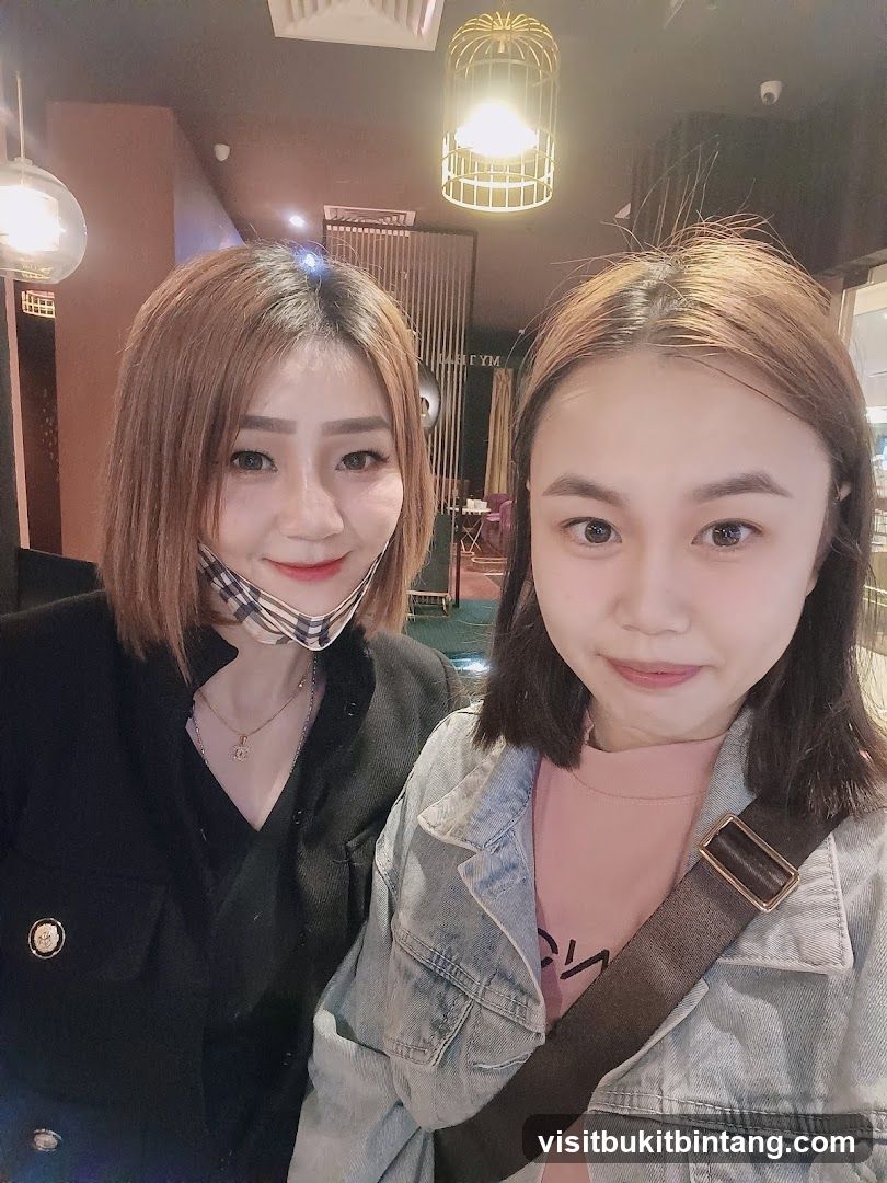 Two women posing for a selfie