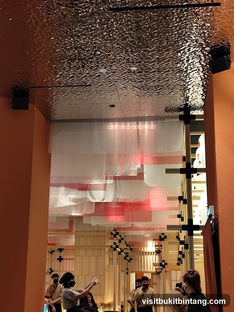 Restaurant Interior with Decorative Ceiling and Staff