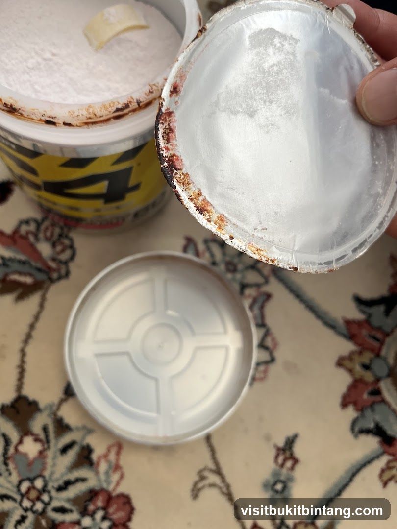 Open container of white powder