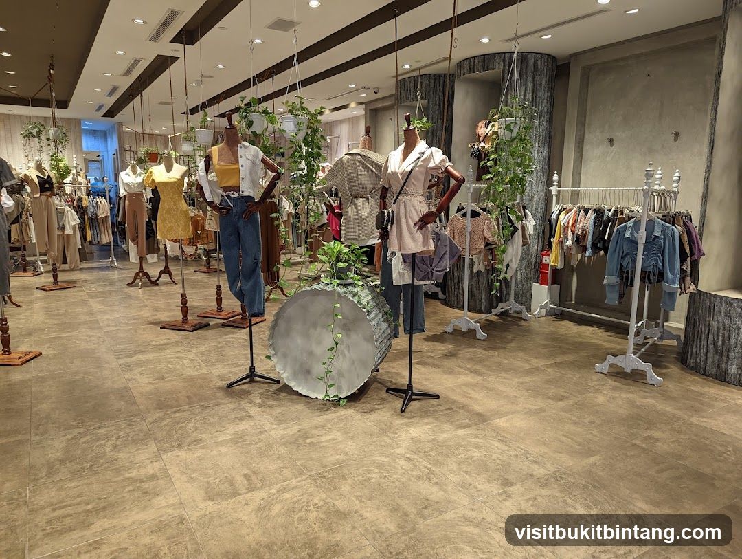 Clothing store interior with mannequins and racks of clothes