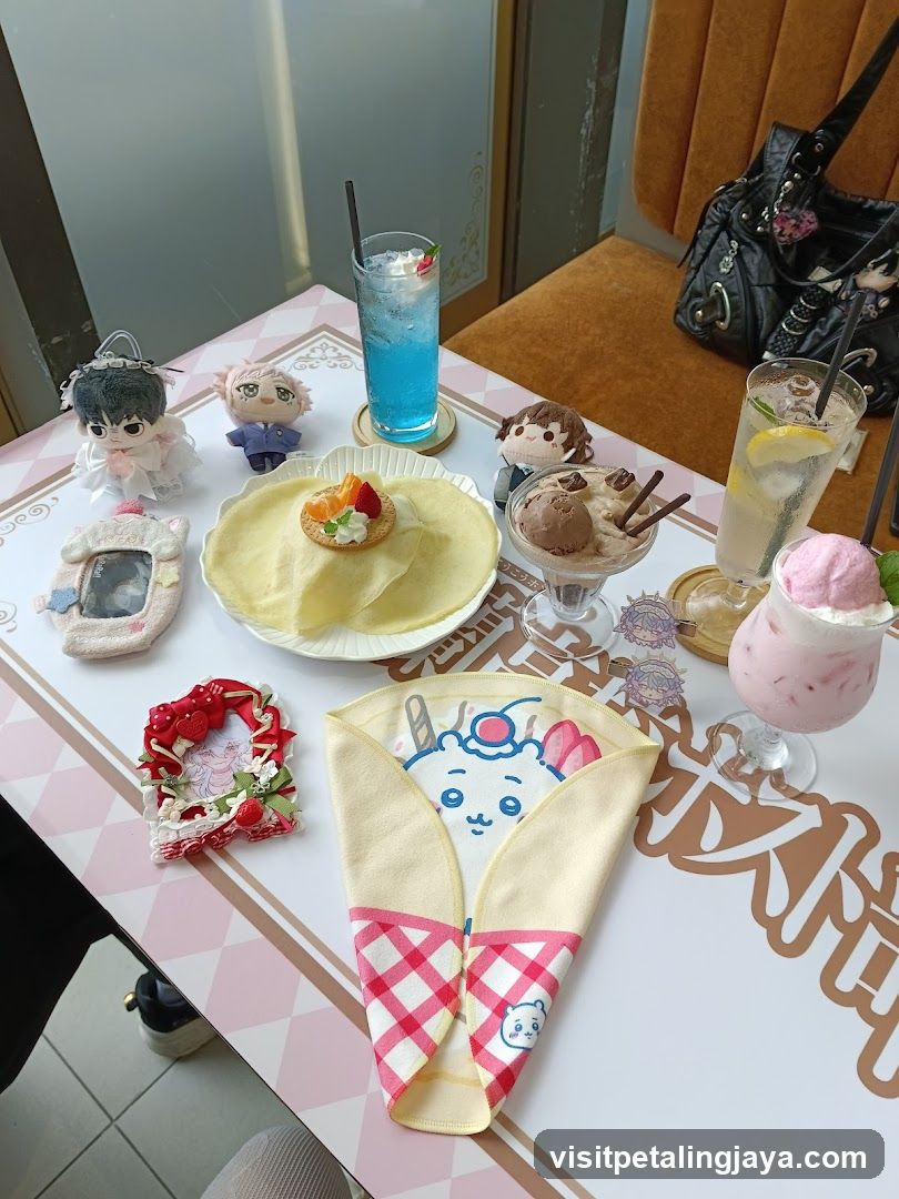 Cafe Table Spread with Desserts and Merchandise