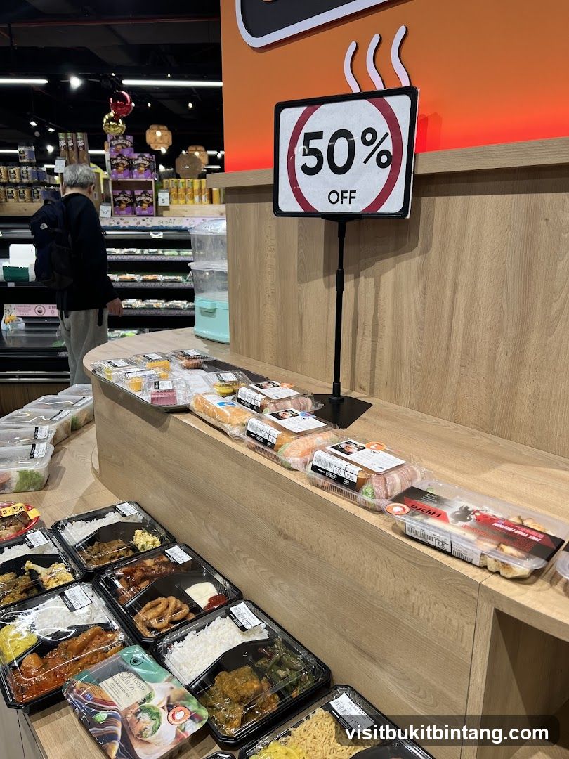 Food display with 50% off sign