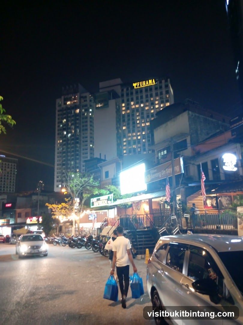 Nighttime street scene with buildings and people