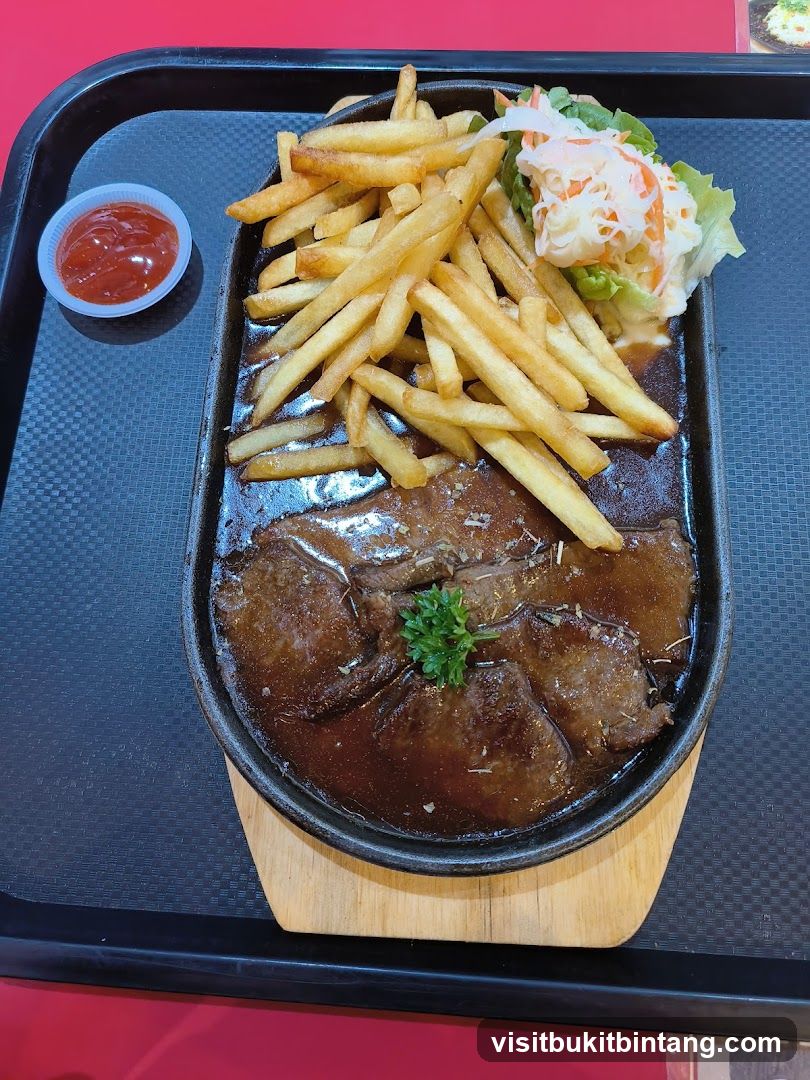 Sizzling Steak with Fries