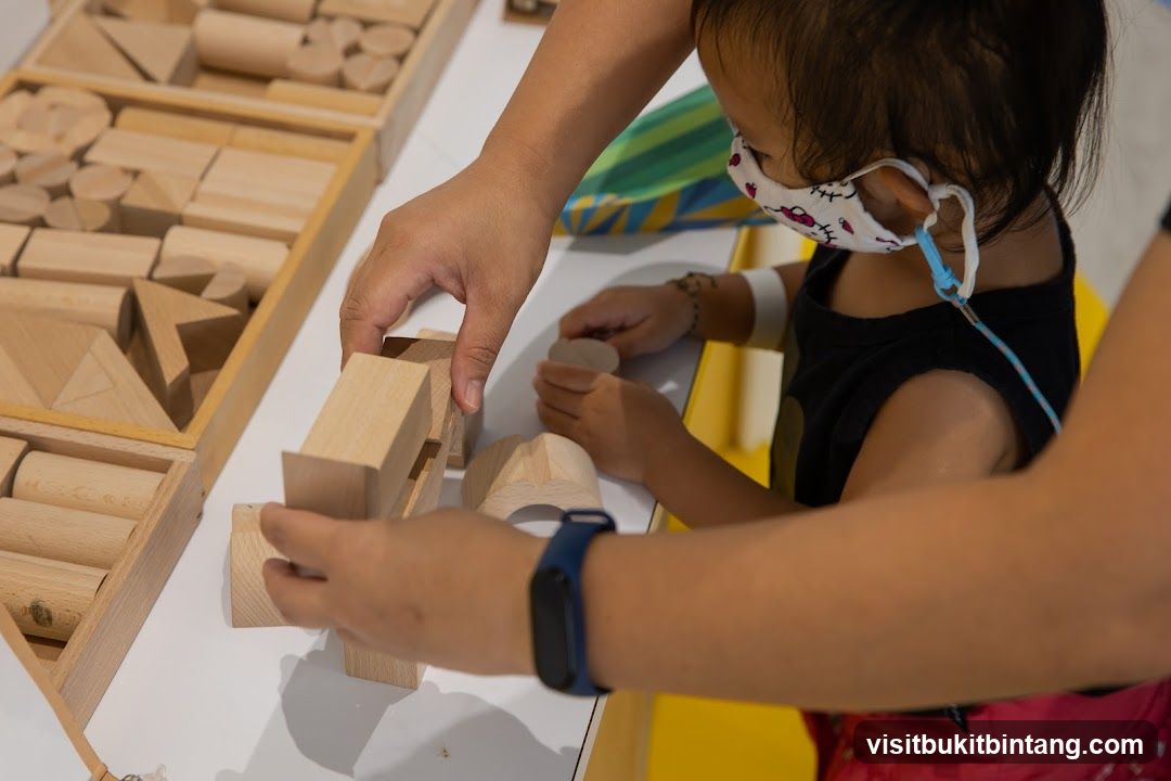 Children playing with wooden blocks