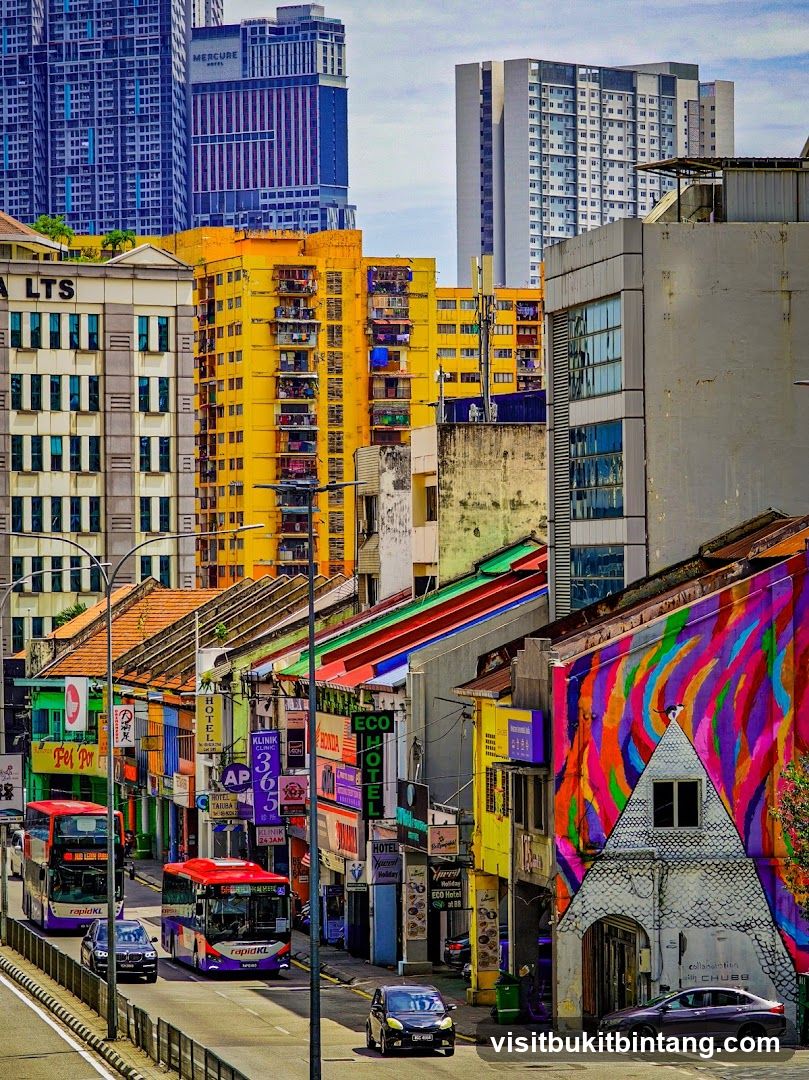 Colorful Street Scene with Buildings and Buses