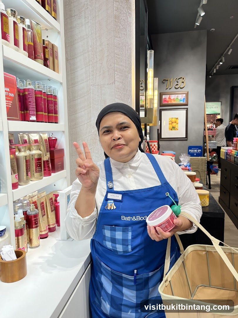Employee holding product