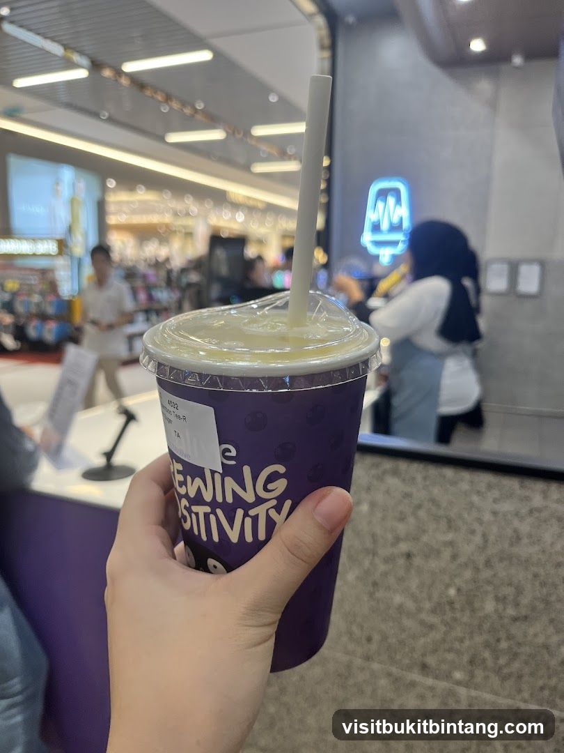 Person holding a drink