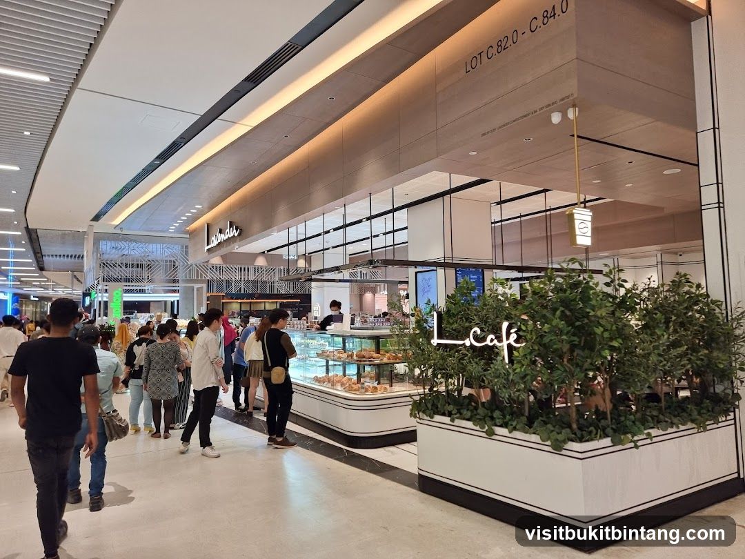 Cafe interior with display cases and seating area