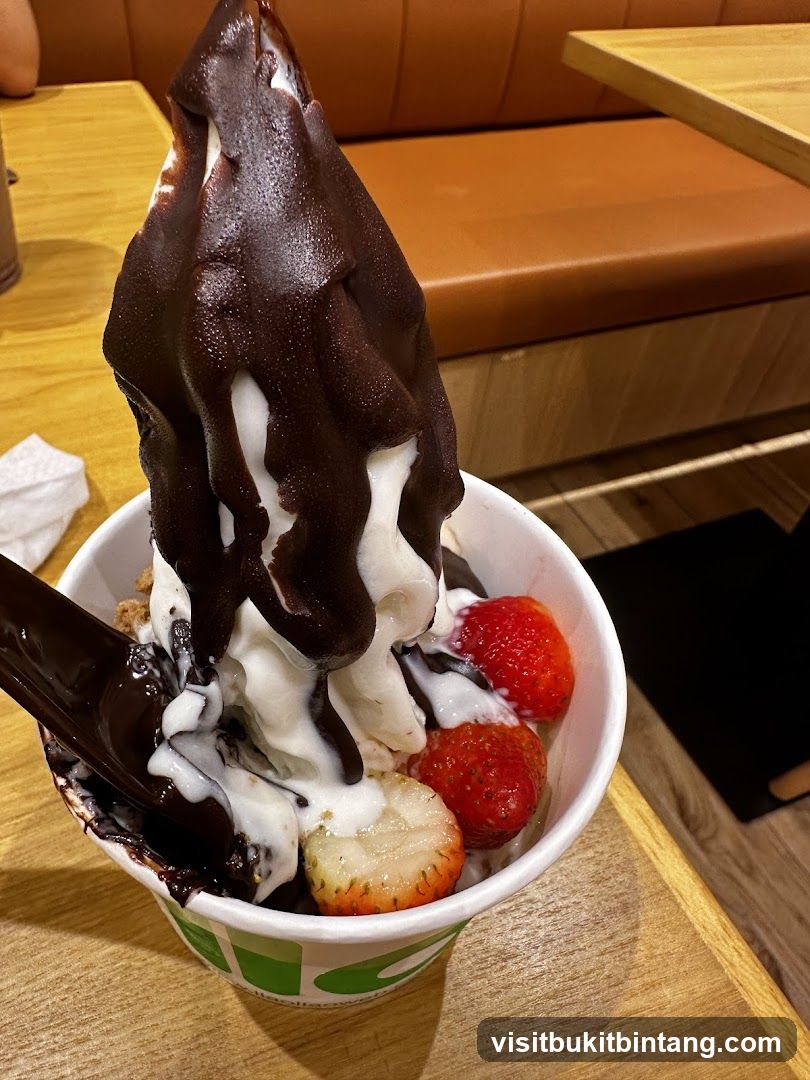 Soft Serve Ice Cream with Chocolate and Strawberries