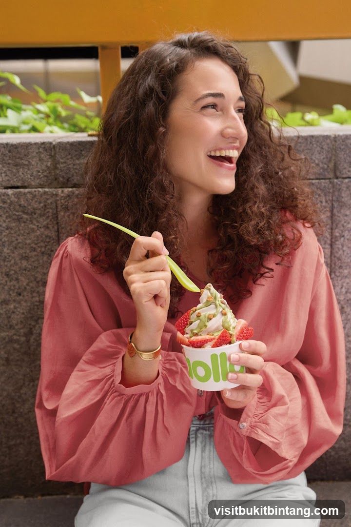 Woman enjoying frozen yogurt