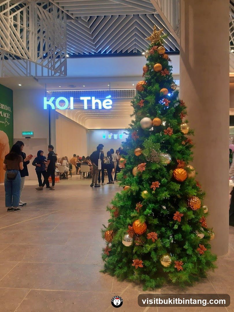 Christmas Tree in Front of Koi Thé