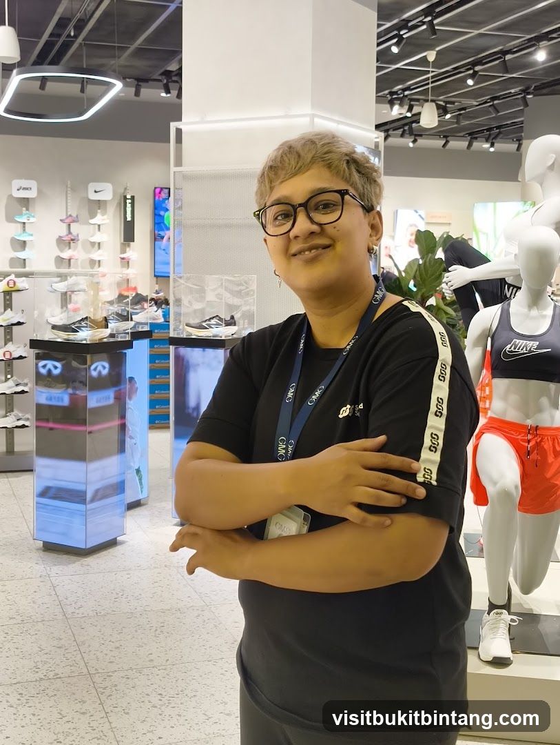 Store employee in athletic wear store