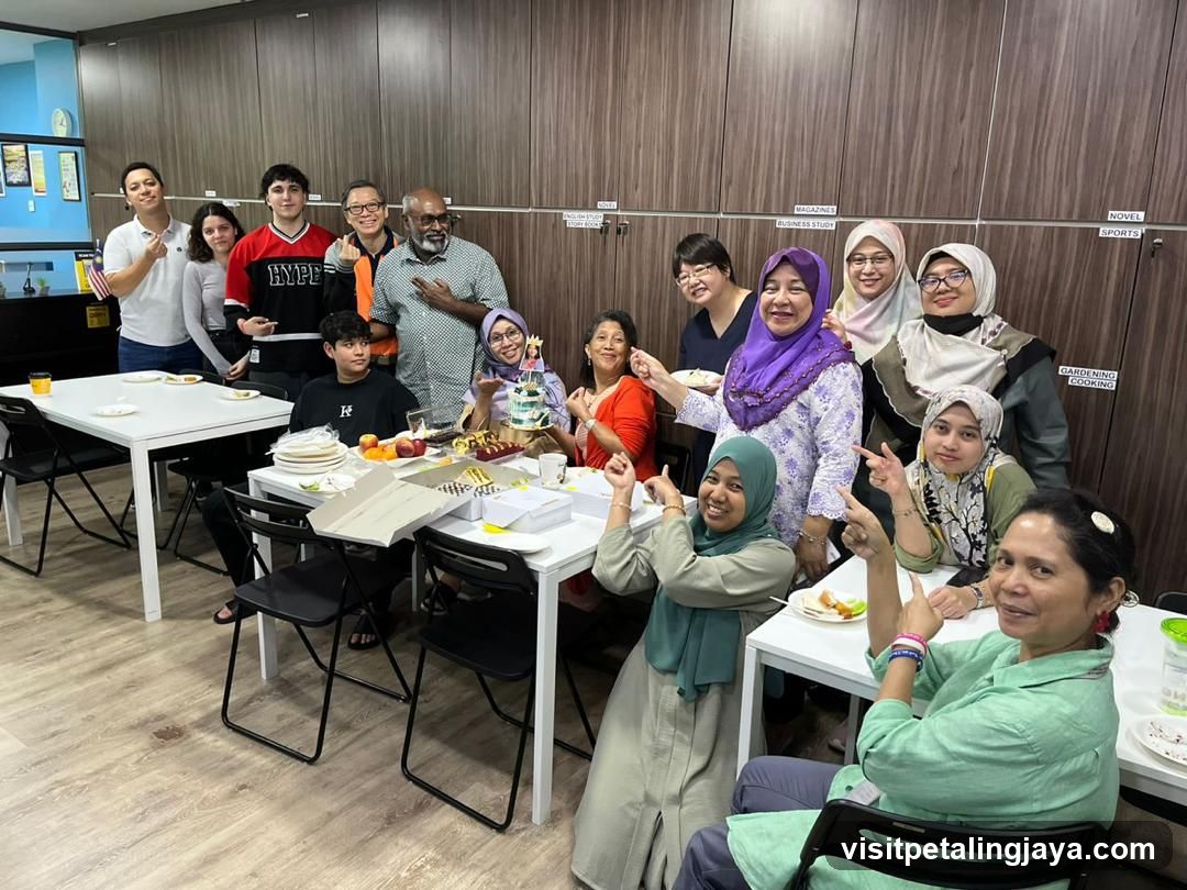Group celebration with cake and food