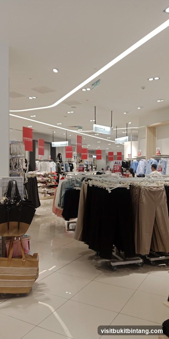 Clothing store interior with sale signs