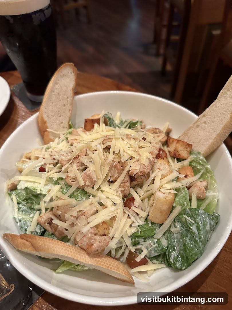 Chicken Caesar Salad with Bread and Beer