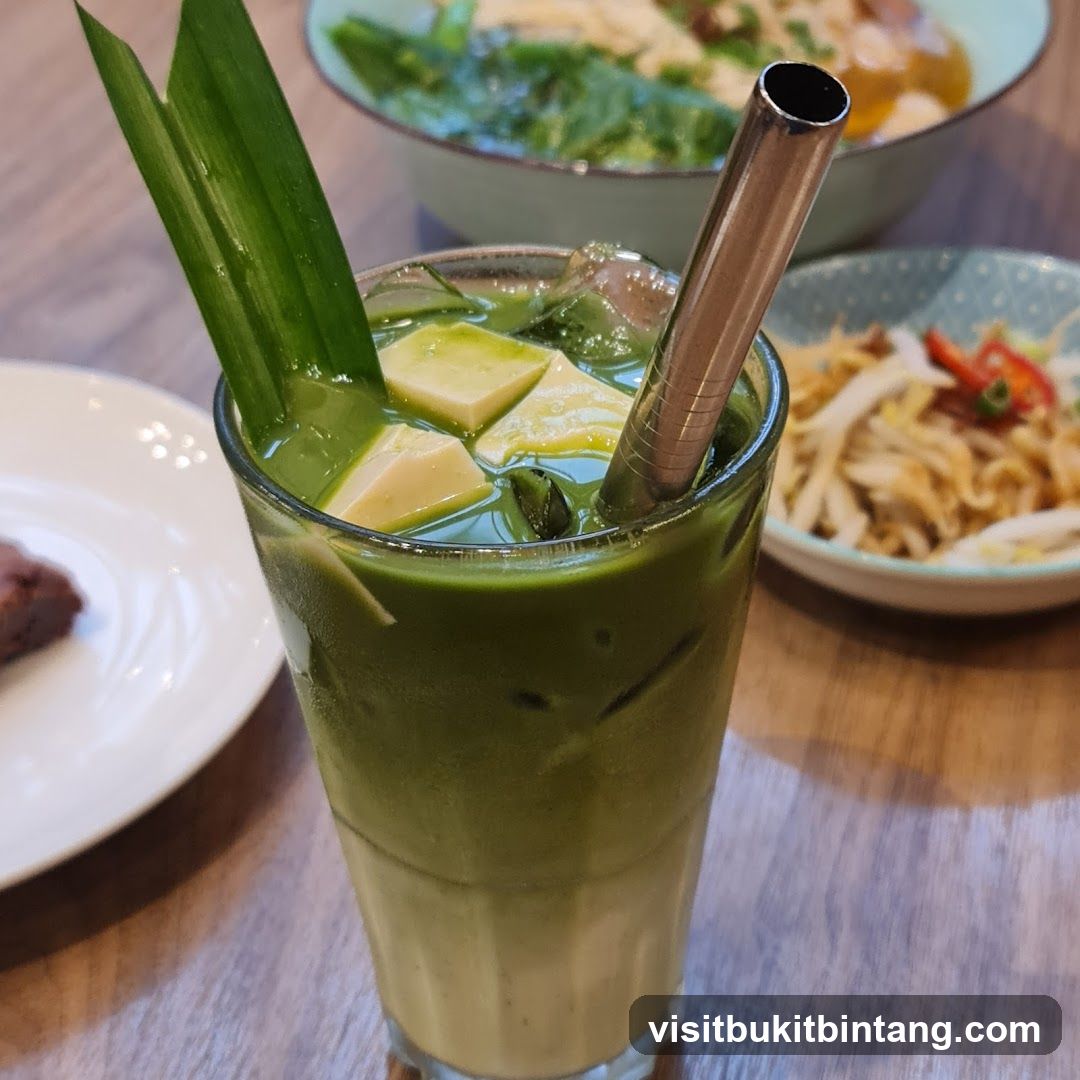 Iced Matcha Drink with Tofu and Pandan Leaves