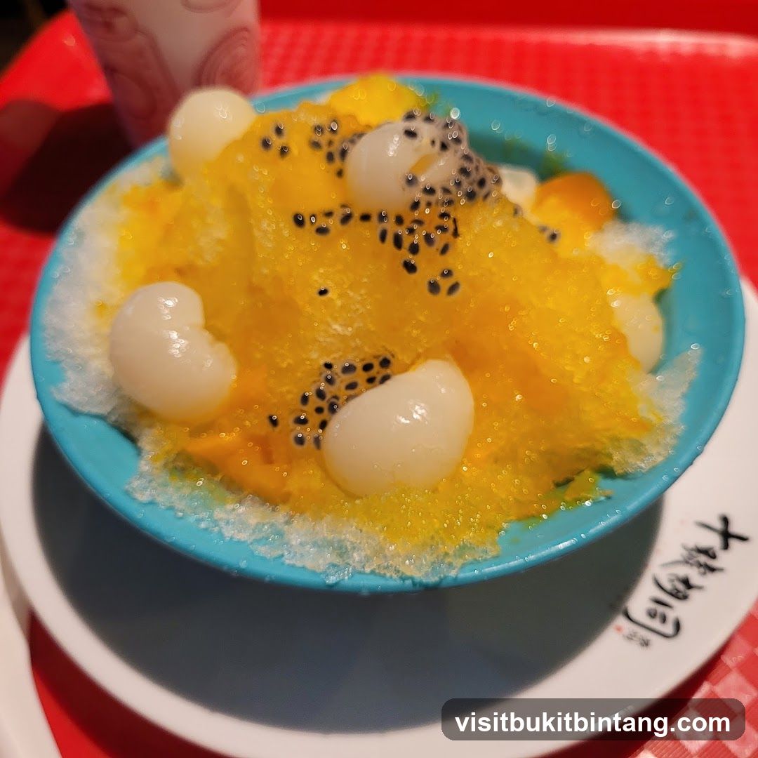 Mango shaved ice with lychee and seeds