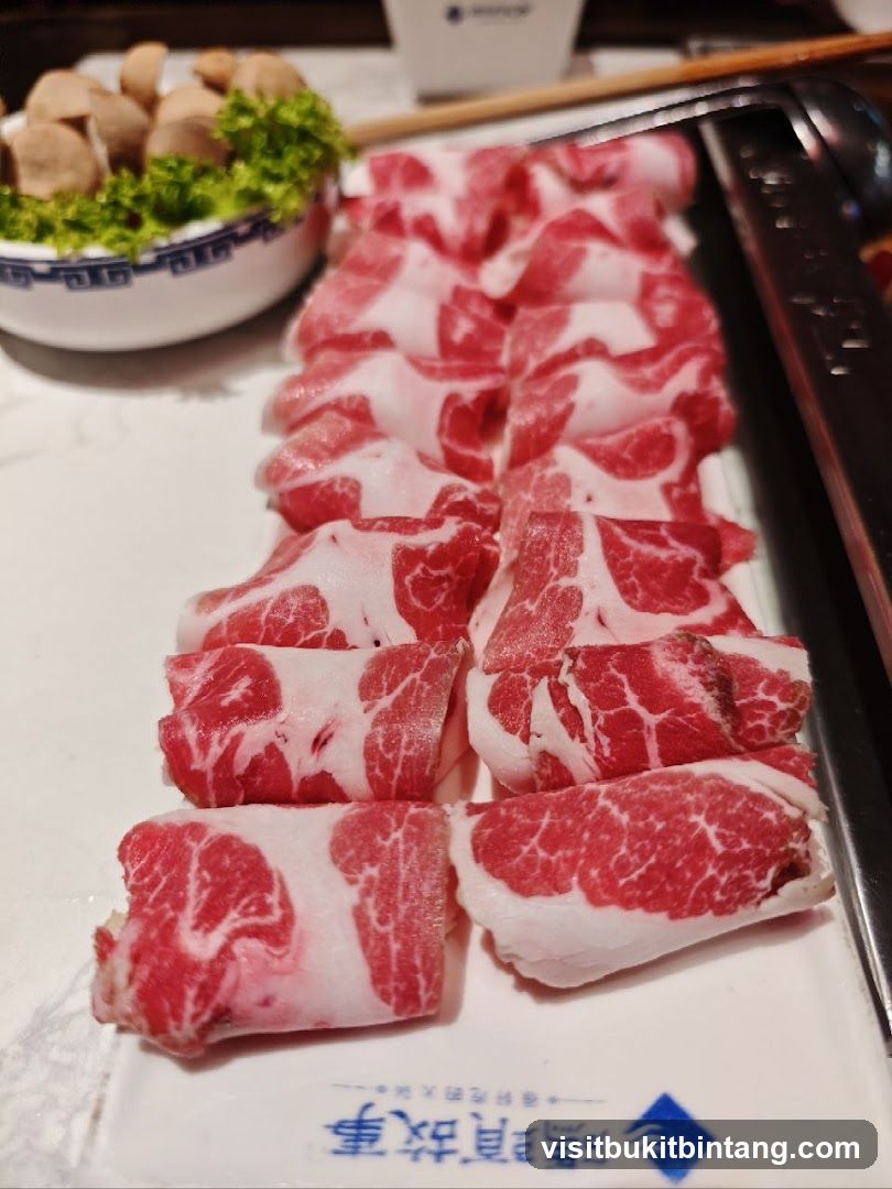 Thinly Sliced Raw Meat and Mushrooms