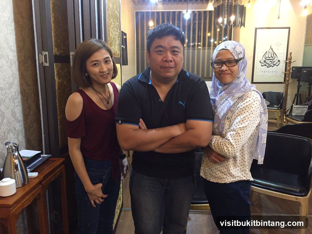Three people posing for a photo