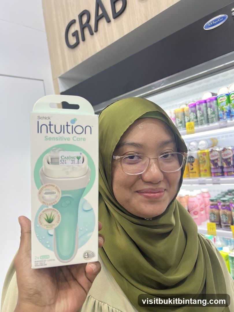 Woman Holding Schick Intuition Razor