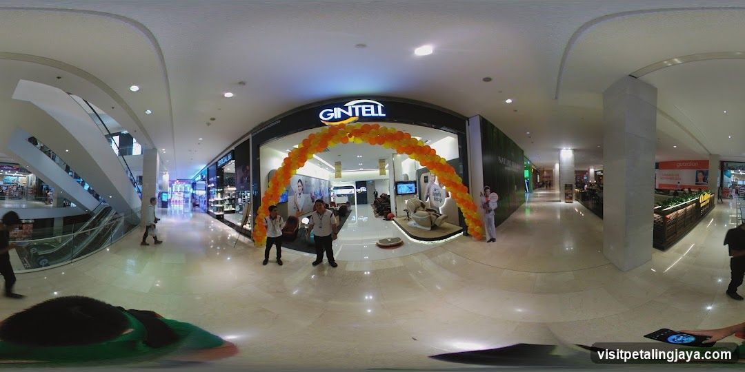 Shopping Mall Interior with Storefronts and Decorations