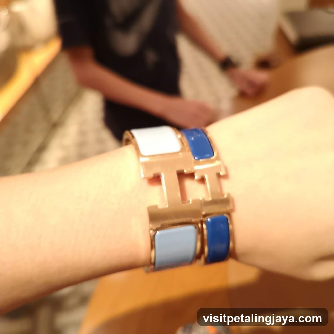 Hermes H-shaped bracelet on wrist