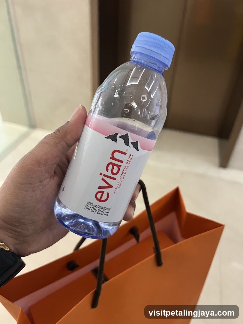Evian Water Bottle with Shopping Bag