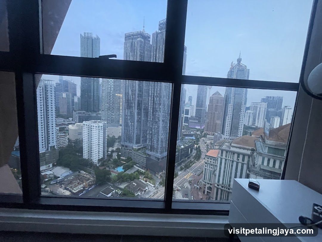 Cityscape View from High-Rise Window