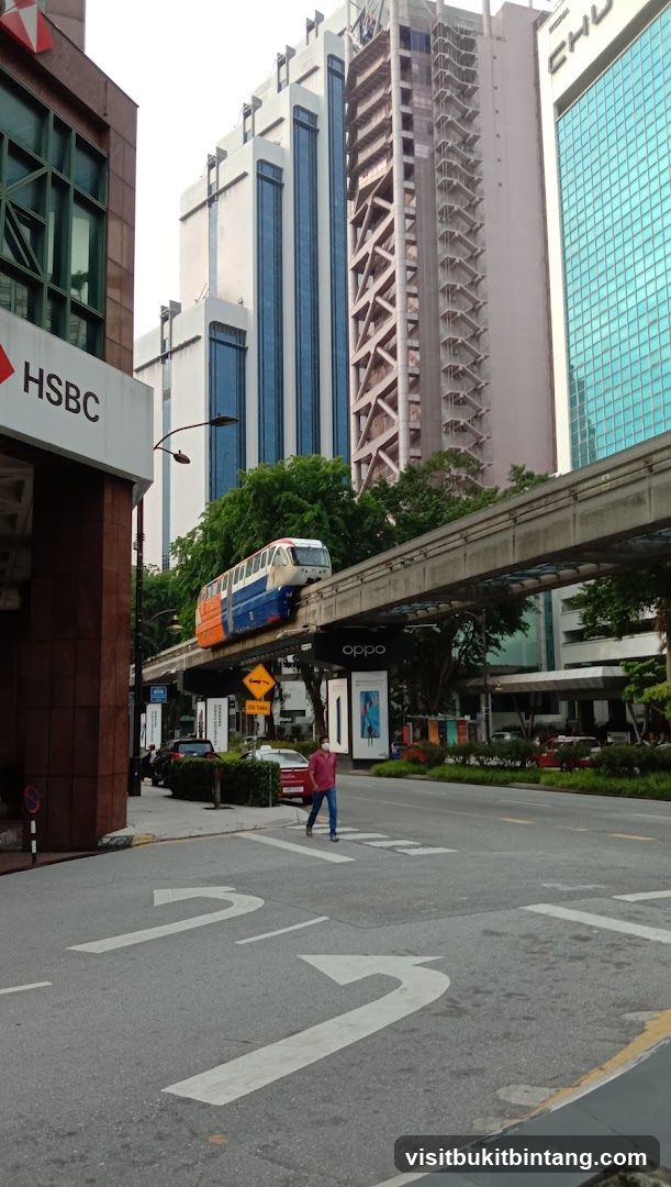 City Street with Monorail and Buildings
