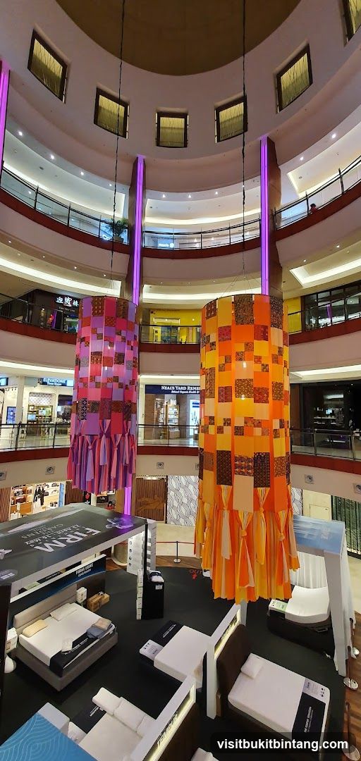 Mall Interior with Decorative Pillars and Bed Displays