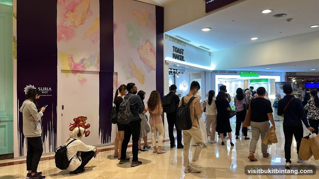 Mall interior with people queuing