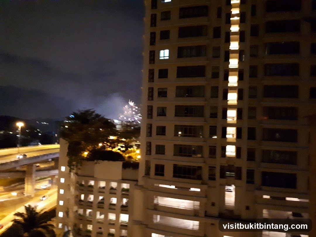 Fireworks display over a city at night