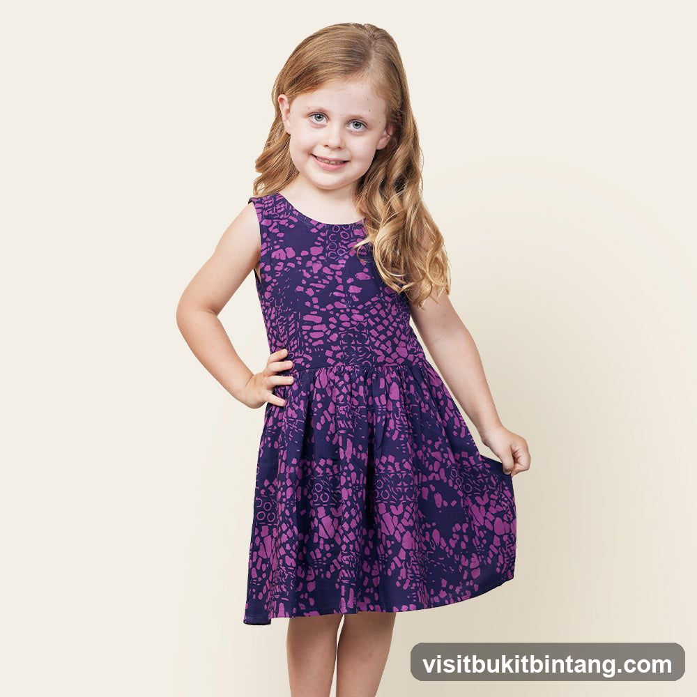 Girl in a purple dress