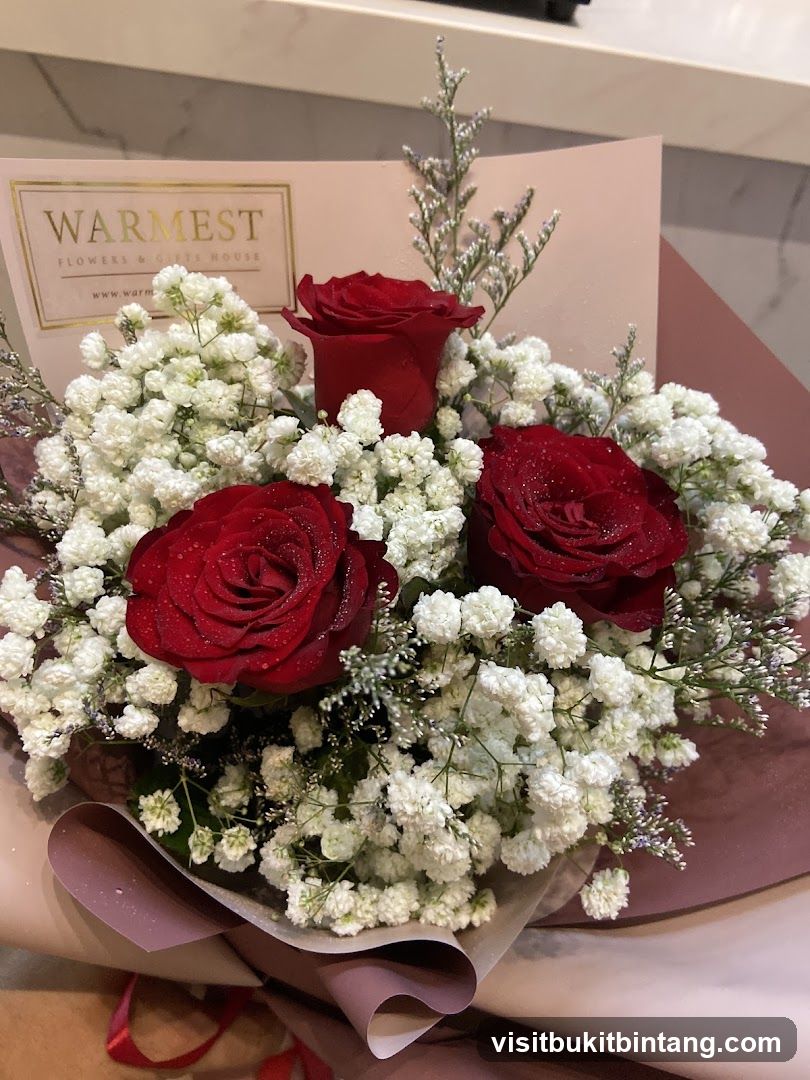 Red Roses and Baby's Breath Bouquet
