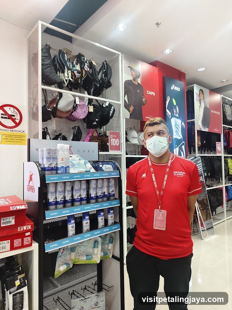 Asics Store Interior with Staff Member