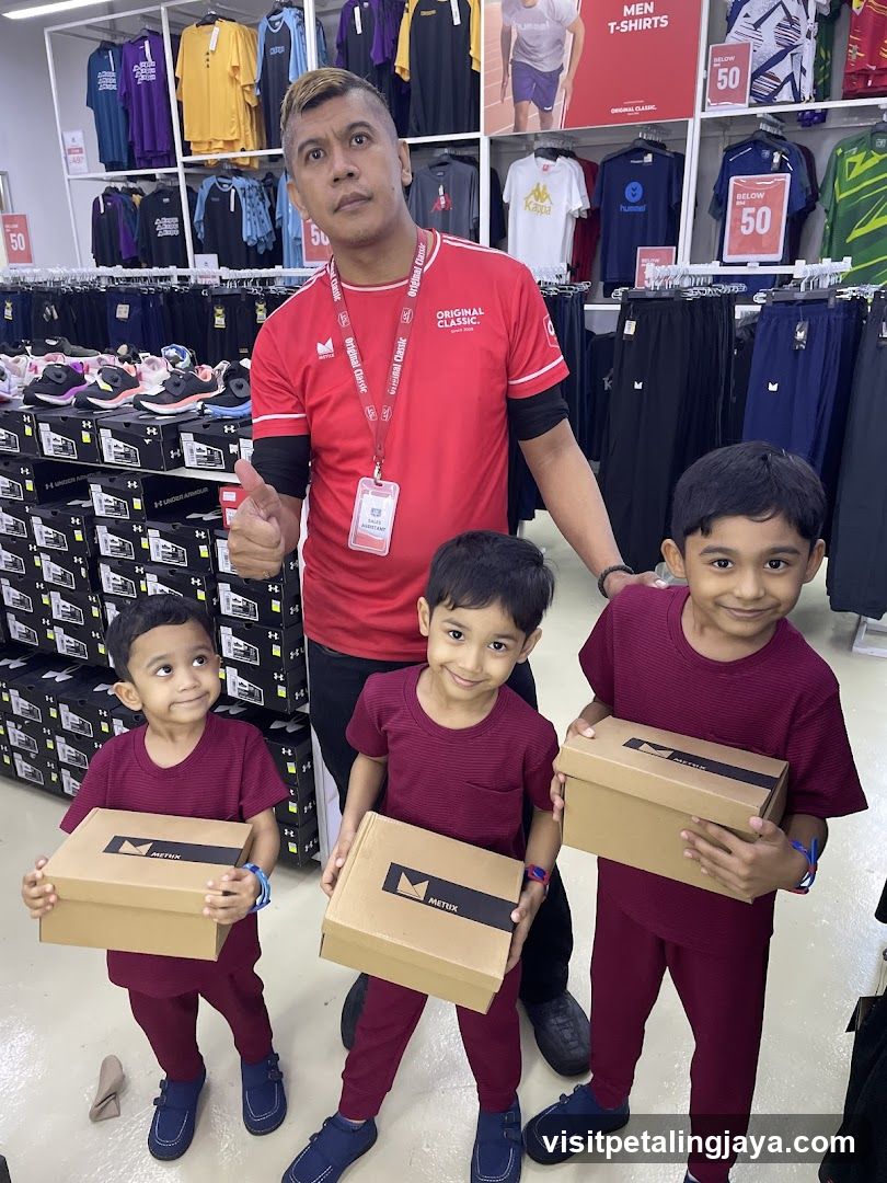 Men's Clothing Store Interior with Staff and Children