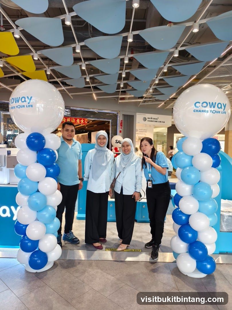 Coway Staff Posing with Balloons
